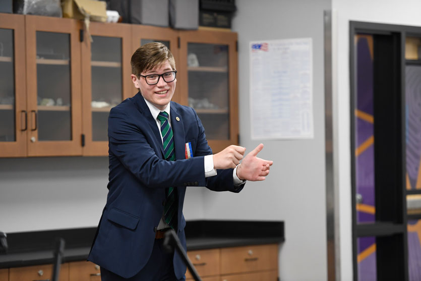 Student competing at the National Tournament in a classroom