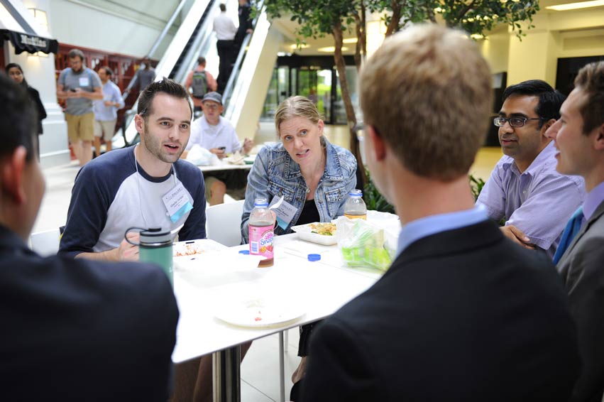 Group of people having a discussion over lunch