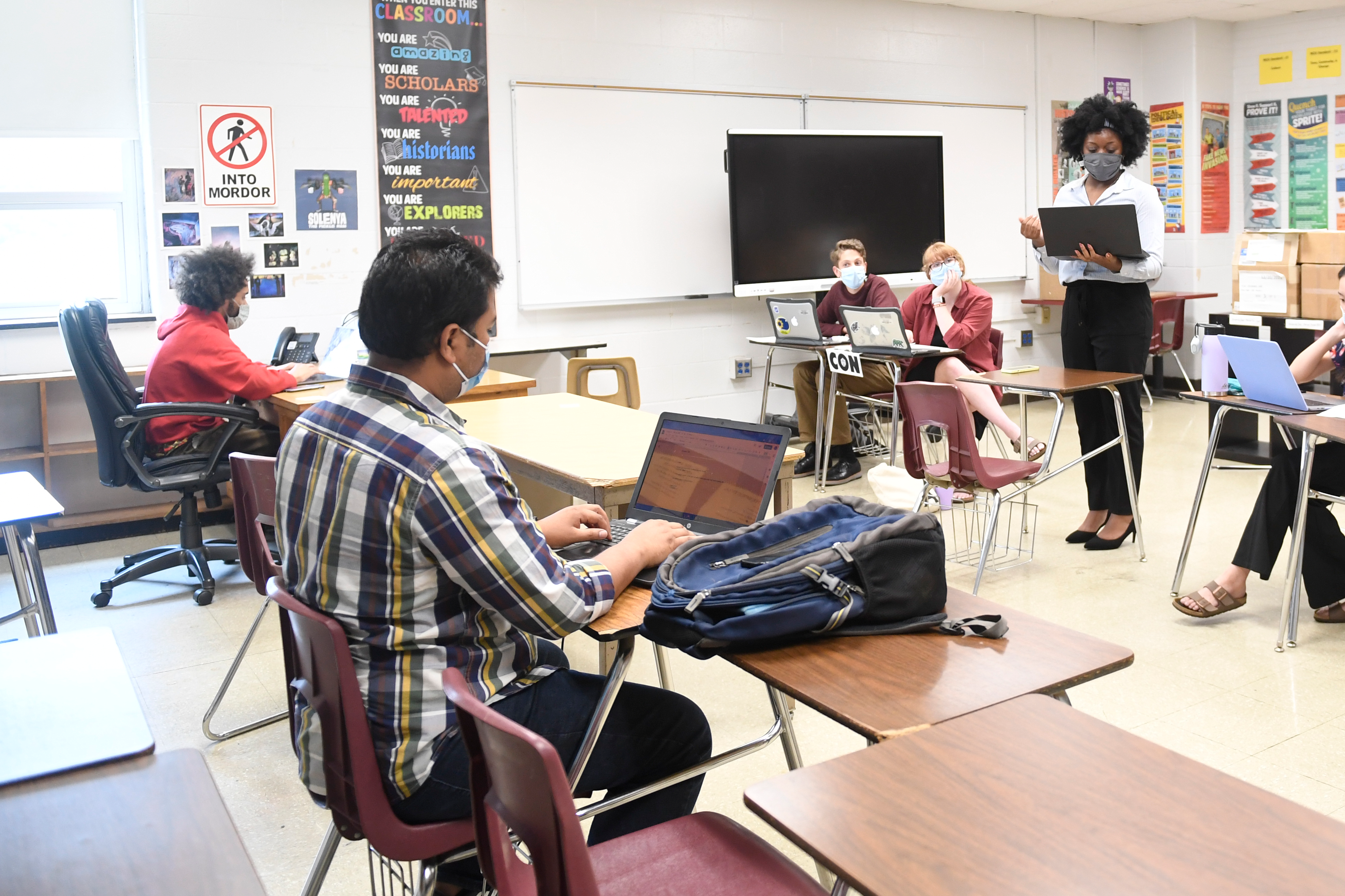 Judges observing students at a tournament