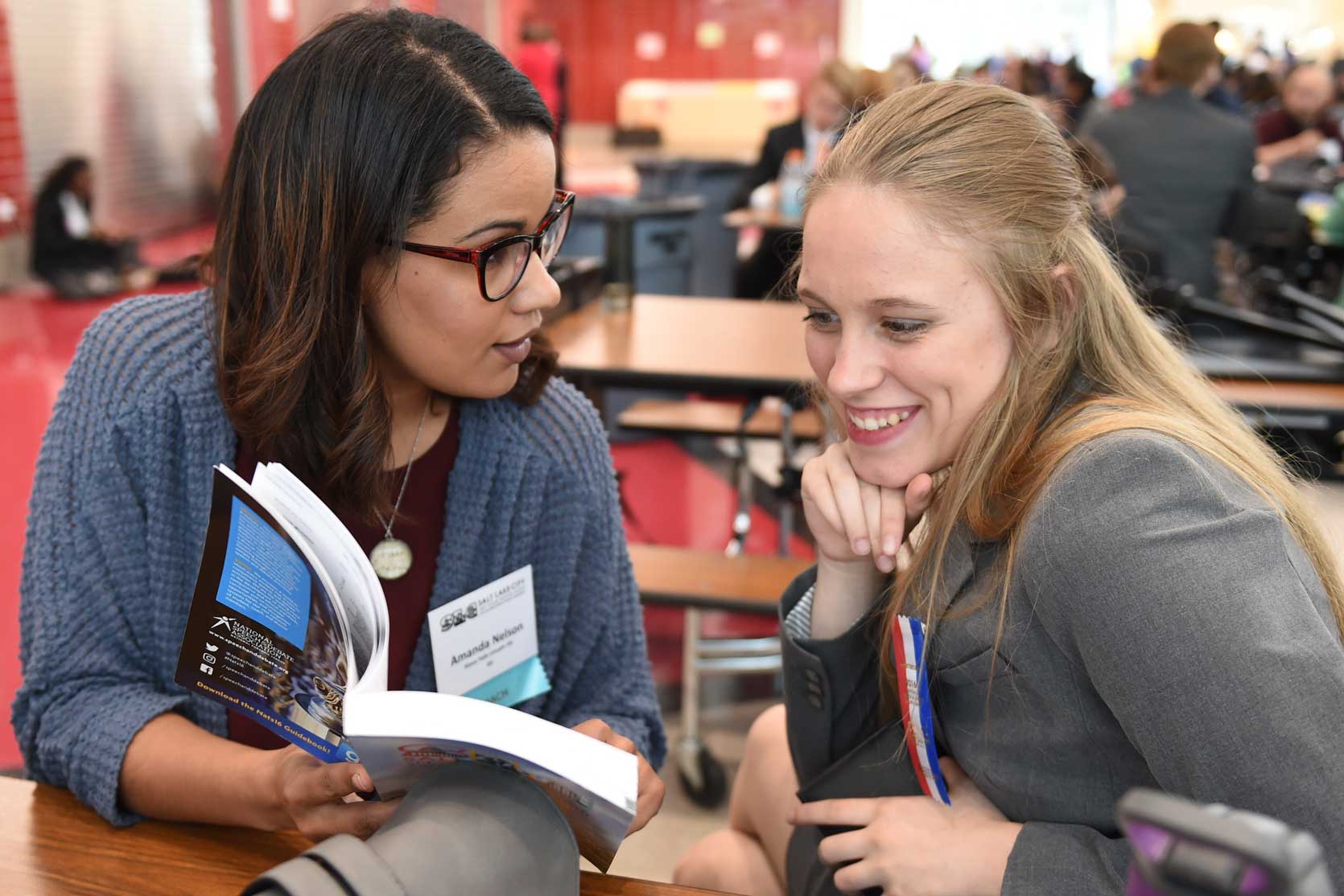 Coach and a student working together in a class