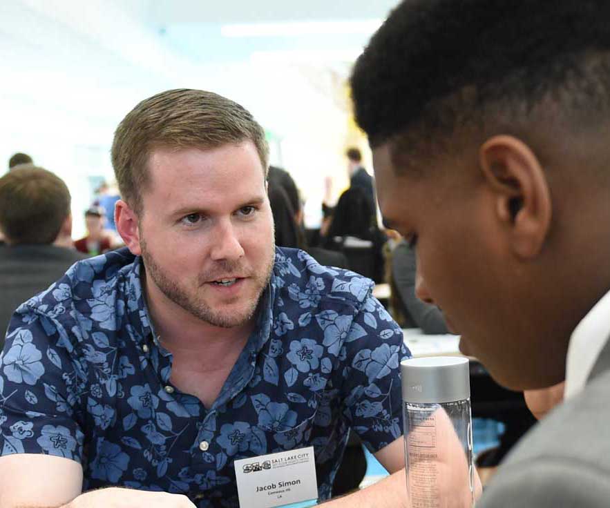 Coach having a discussion with a student