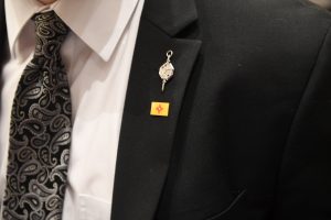 Suit and tie with Honor Society Pin