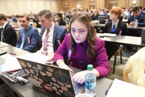 Speech and Debate Student working on laptop