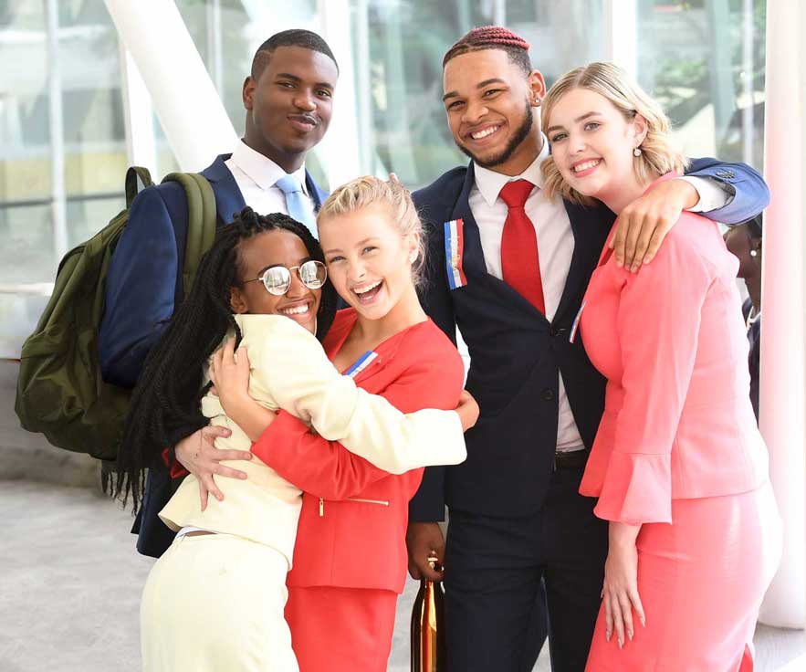 Group of students gathered close together at a competition