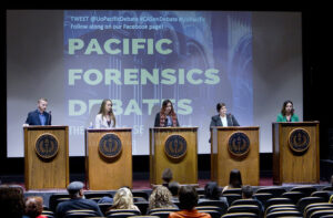 Group of Women speaking online behind podiums