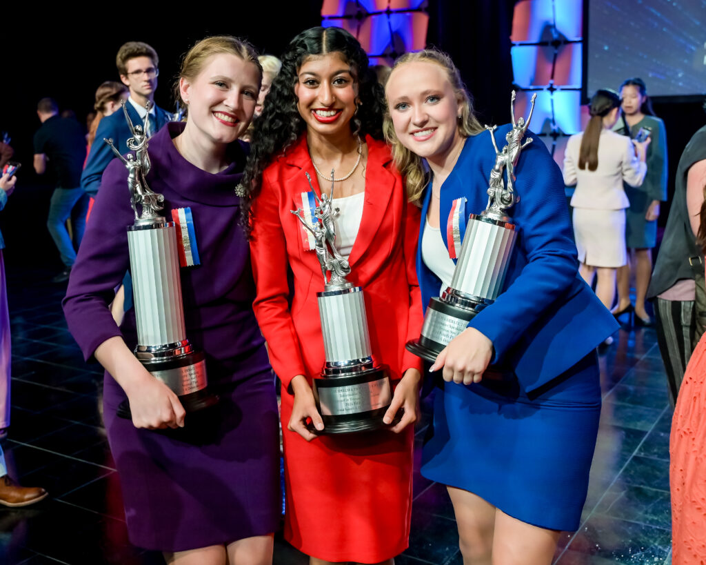 Students with their trophies at the National Tournament