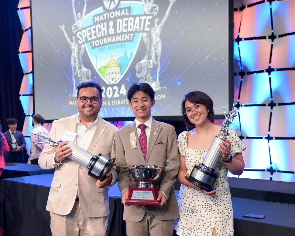 Students with their trophies at the National Tournament