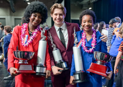 Students with their trophies at the National Tournament