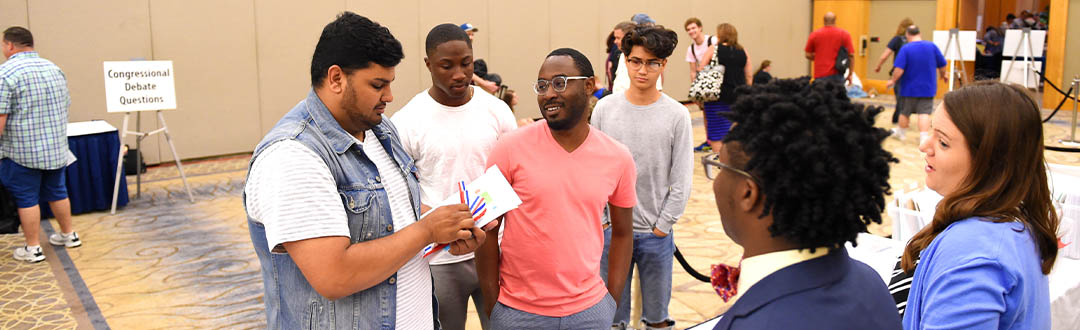 Students discussing things at a tournament