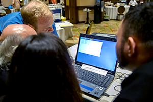 Speech and Debate Student working on laptop