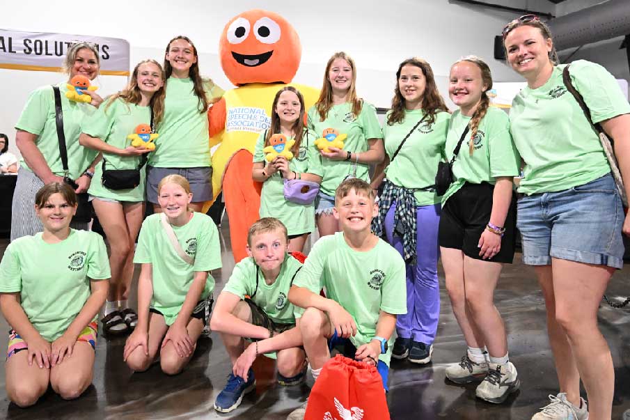 Group of people posing at the National Tournament