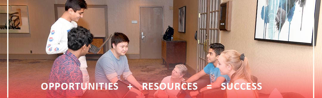 Resource Package - Students and Coach Gathered in a Classroom
